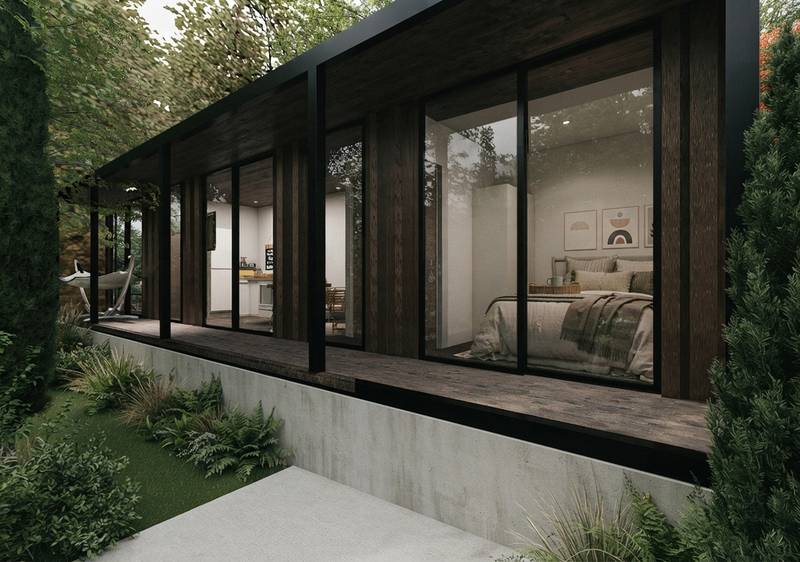 Detalle de fachada con ventanales y habitación